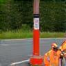 Warnweste, Warndreieck und Notrufsäule auf österreichischer Autobahn